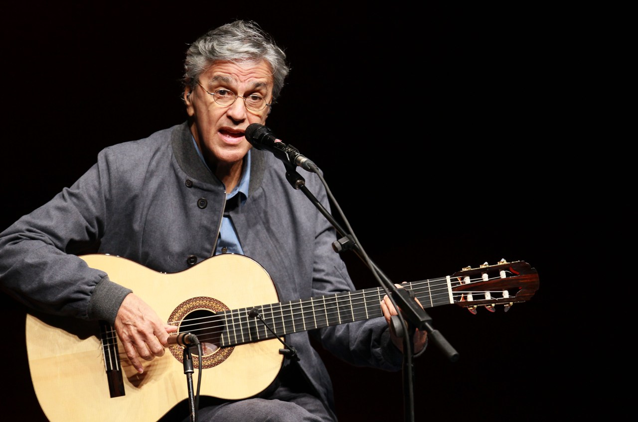 Renown Brazilian musician Caetano Veloso performs in the sidelines of the Rio+20 environmental summit on June 13, 2012 at the Fort of Copacabana in Rio de Janeiro, Brazil. The UN Conference on Sustainable Development opened Wednesday, launching a new round of debate on the future of the planet, its resources and people, 20 years after the first Earth Summit. AFP PHOTO/ARI VERSIANI (Photo credit should read ARI VERSIANI/AFP/GettyImages)